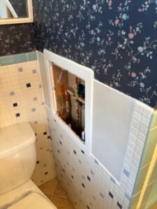 Rental bathroom decor idea with peel and stick removable wallpaper