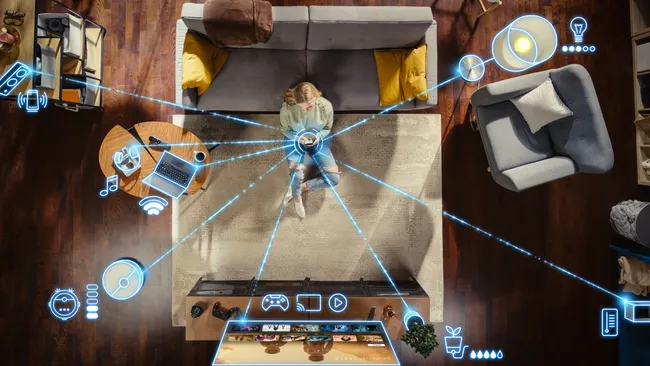 Smart home lighting being controlled from a smartphone app connected to Alexa and Google Assistant