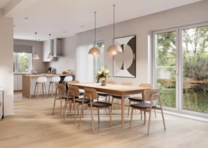 Bright open-plan kitchen and dining area with island seating, pendant lights and a wooden dining table kitchen and dining area design ideas