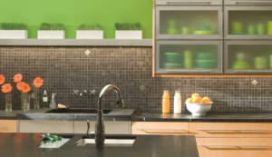 Kitchen backsplash ideas using handmade-look green tile behind a stove
