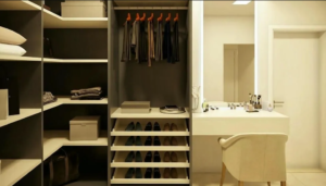 Modern bedroom wardrobe design ideas with floor-to-ceiling sliding doors and LED lighting